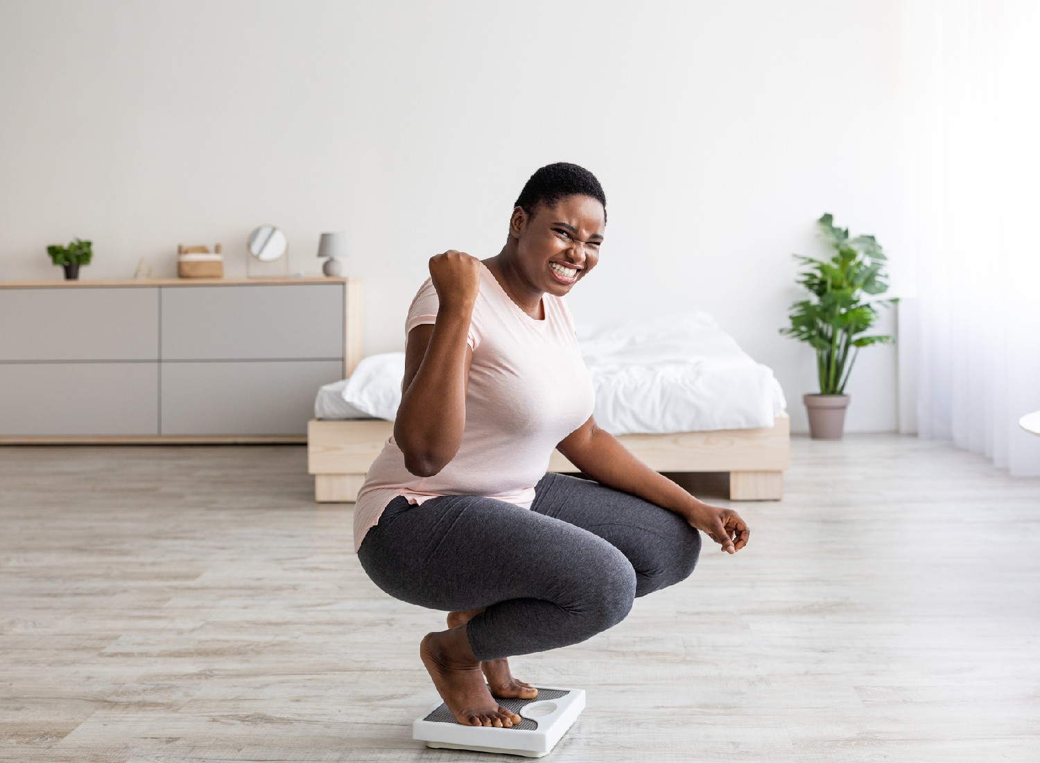 fitness-goals the-independence Overjoyed plus size African American lady achieving her weight loss goal