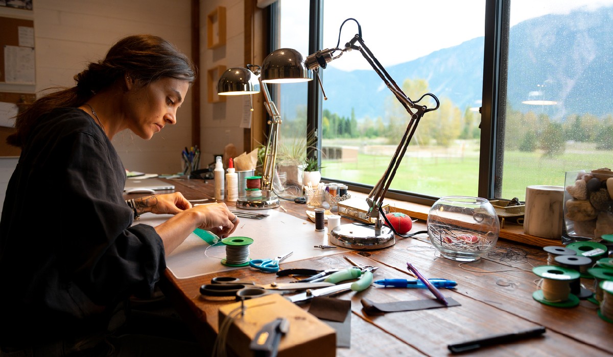 handmade jewelry independence Female jeweller working from her home office