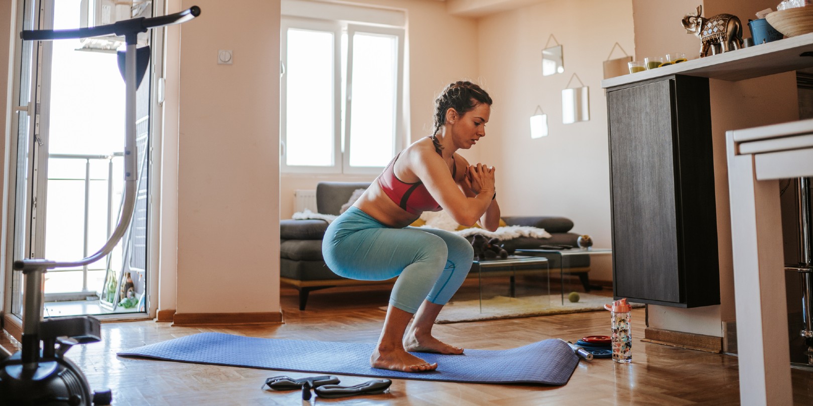 increase-endurance the-independence Young woman doing home workout in living room