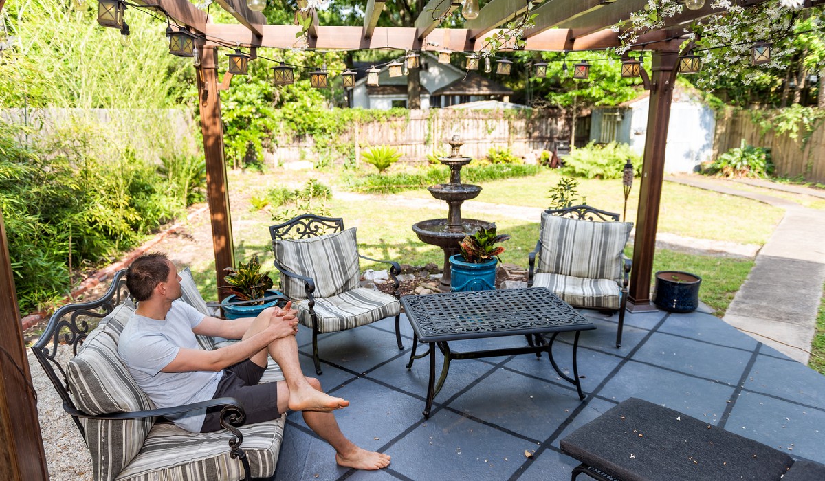 pergola canopy independence Young man sitting on pergola canopy
