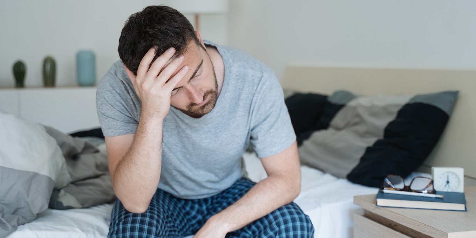 how-lack-of-sleep-affects-health the-independence Man with sleeping problem wake up feeling tiredness
