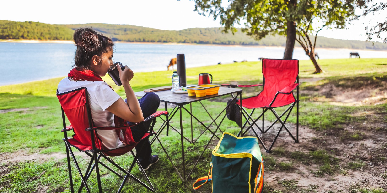 camping-food-list the-independence Woman drinking coffee