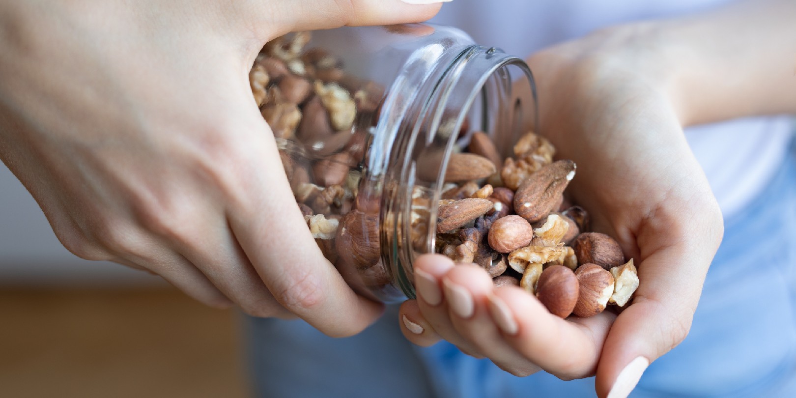 Nuts in woman hands