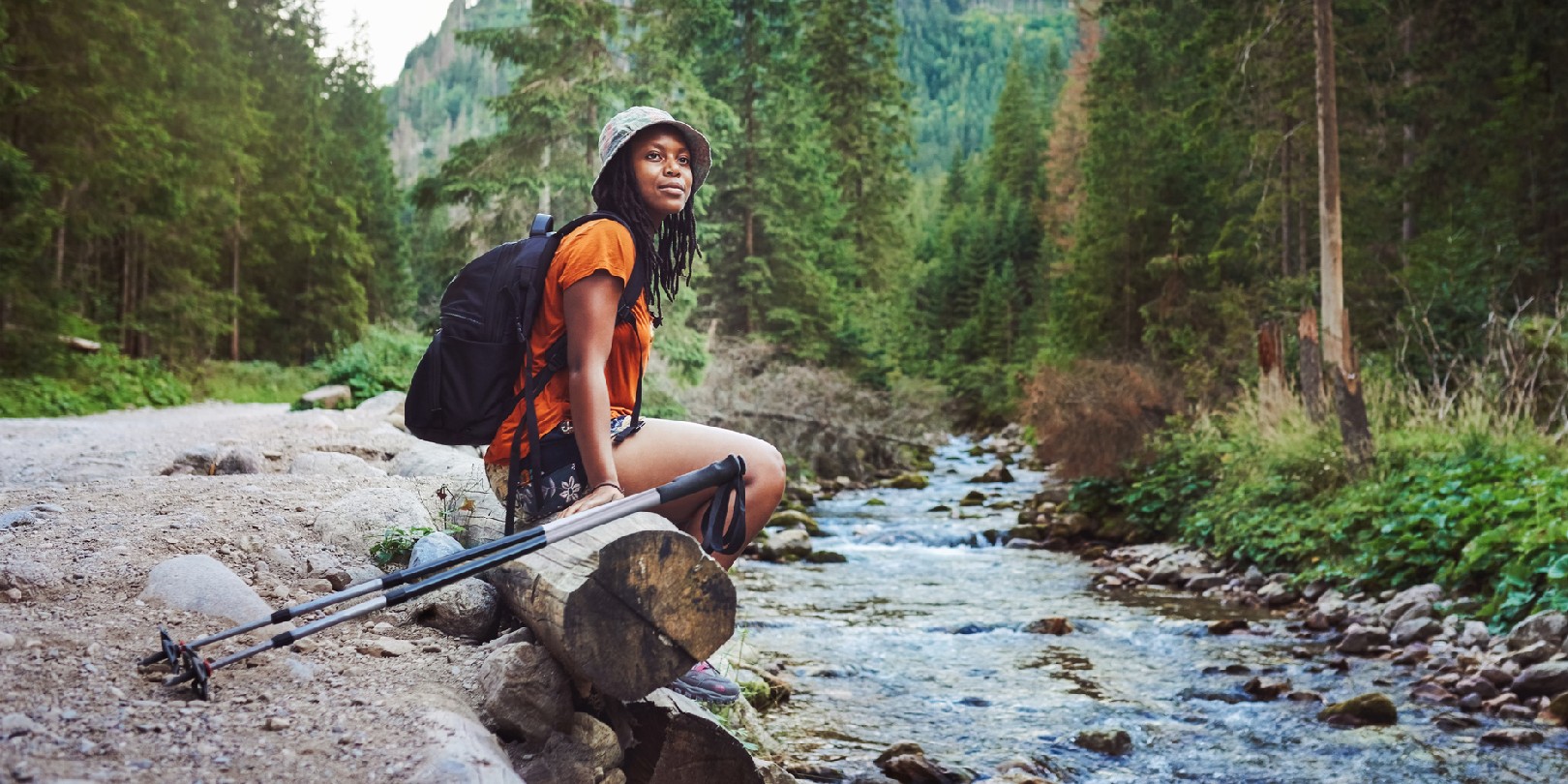 summer-hiking-outfits the-independence Shot of a young attractive woman hiking in nature