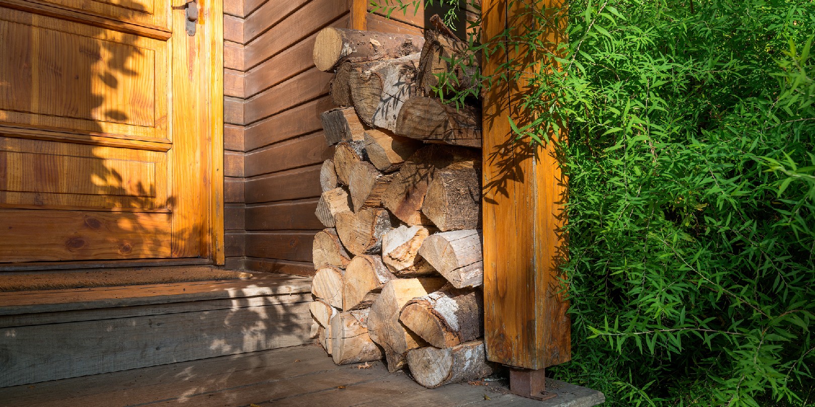 cottage-core-aesthetic the-independence Stack of firewood outside a cabin.