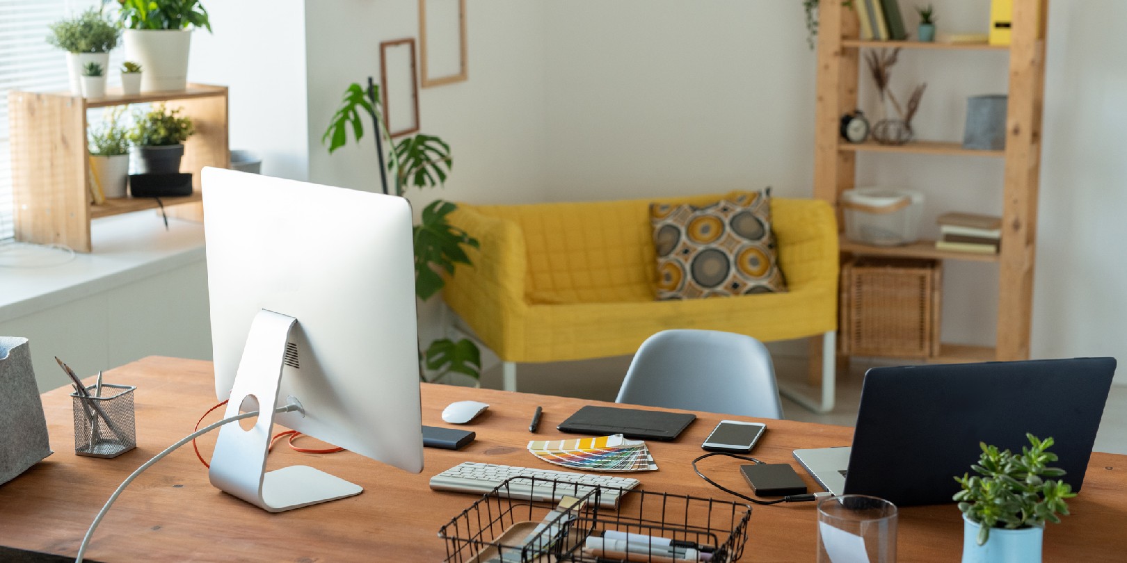 home-office-ideas the-independence Workplace of contemporary manager or freelancer with computer monitor standing on wooden table surrounded by home environment