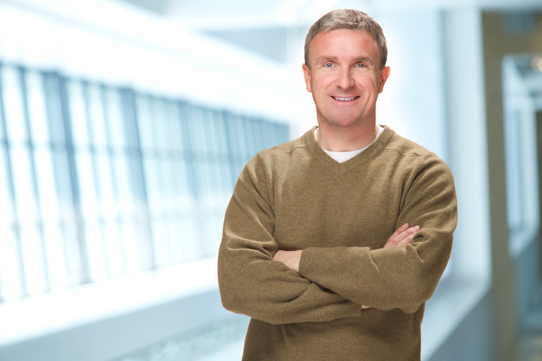 v-neck-sweater-theindependence Casual man wearing v-neck sweater at the office